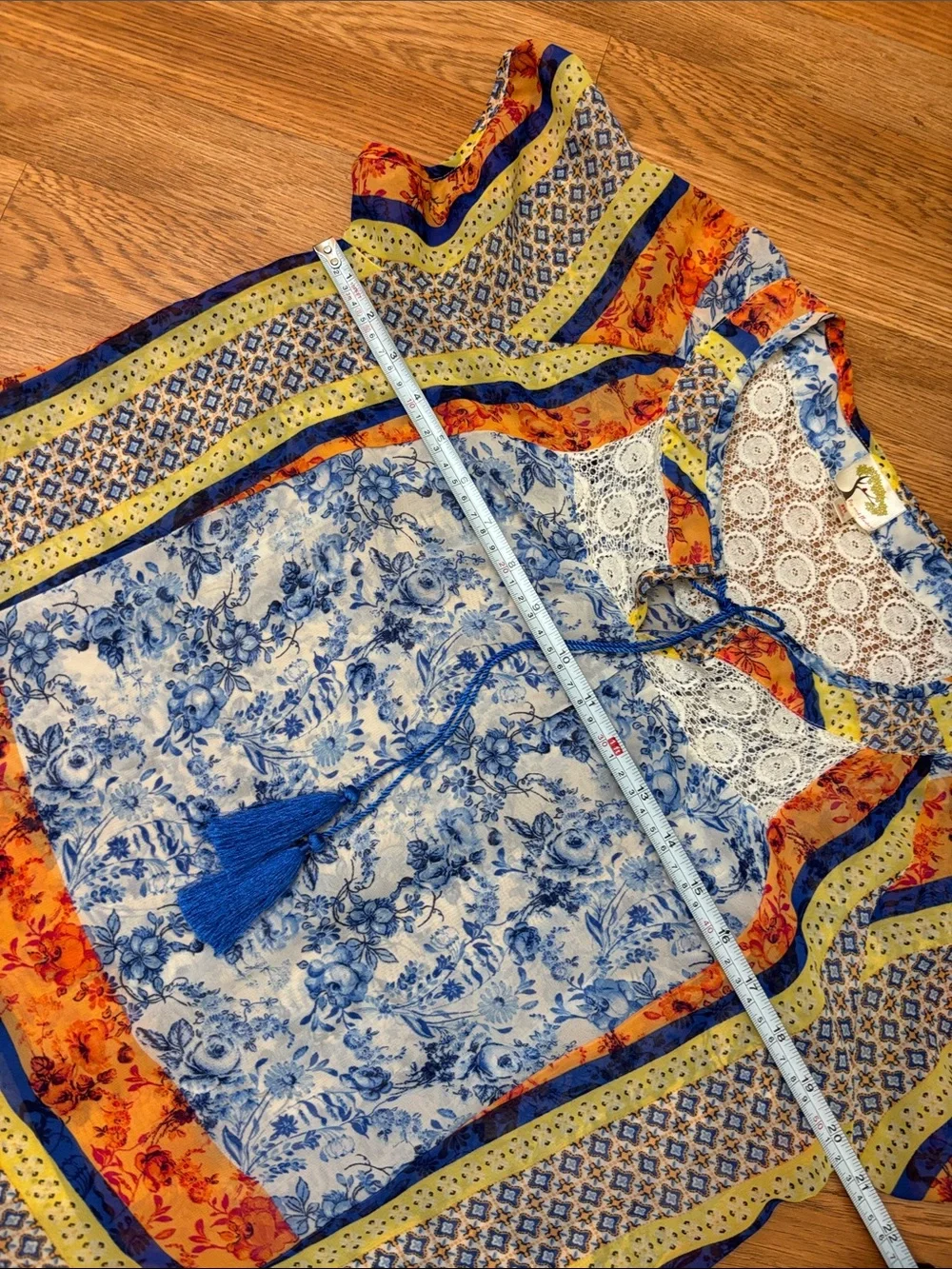 Fig & Flower blue, yellow & orange short sleeve semi-sheer top. Size M.